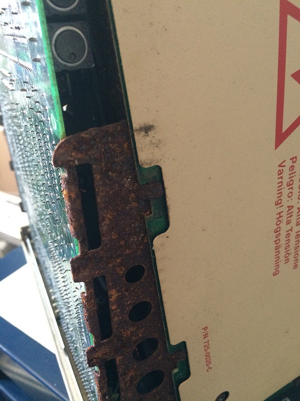 Mac SE motherboard drawer, rusty side