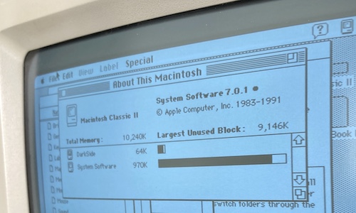 An extreme close-up on the About This Macintosh window, showing the computer has 10MB of RAM and is running System 7.0.1
