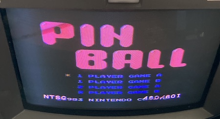 The Pinball title screen, with the PVM showing it is a 480/60I NTSC signal.