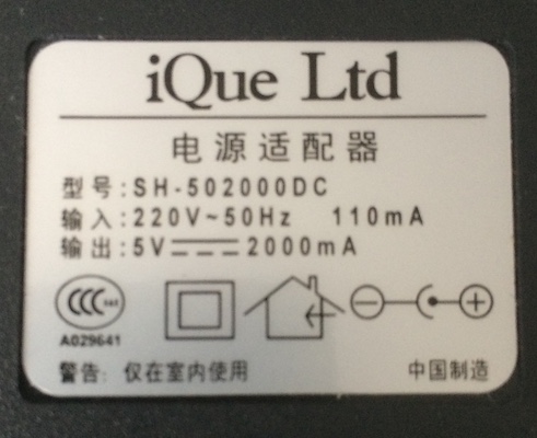 The label from the original Chinese power supply. It says 220V input, 5V 2000mA output. Centre positive.