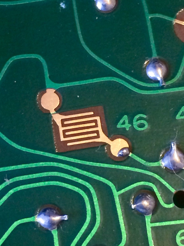 The test pad for #46 has a little solder glob on it.
