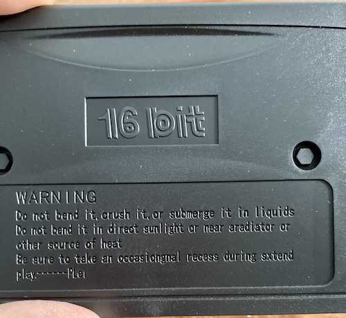 Warnings on the back of the case read: WARNING Do not bend it, crush it, or submerge it in liquids. Do not bend it in direct sunlight or near aradiator(sic) or other source of heat. Be sure to take an occasiongal(sic) recess during sxtend(sic) play. ------ PLei