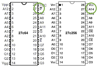 Pin 27 is highlighted on both a 27c64 and a 27c256 EPROM. The circled pin says P with a bar over it on the 64, and A14 on the 256.