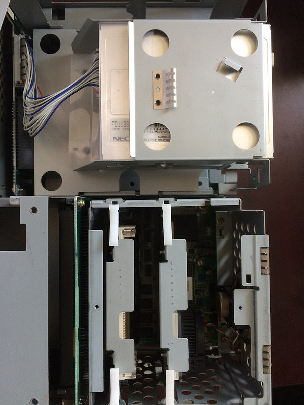 Floppy drive cage and CPU/memory cage