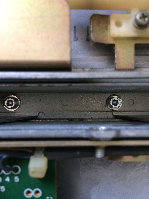 Cammed-out mounting screws
