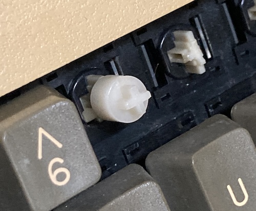 The removed "7" key shows that it has a cylinder with a little cross at the top underneath.