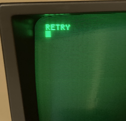 The monitor is displaying RETRY and a cursor.
