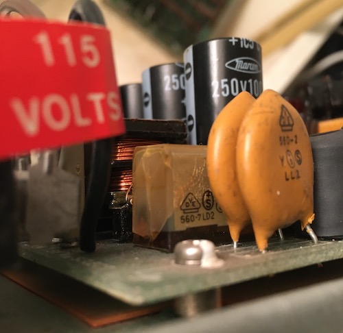 The cracked and crazed RIFA X2 sits in the foreground next to some PTCs.