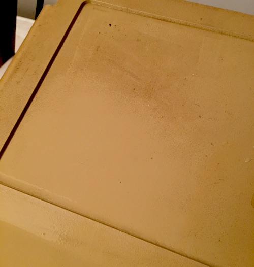 The top case has been scrubbed in the corner. You can see a distinct contrast between the clean, if yellowed, plastic, and the dark nasty parts that haven't been cleaned yet. Who needs retrobright?