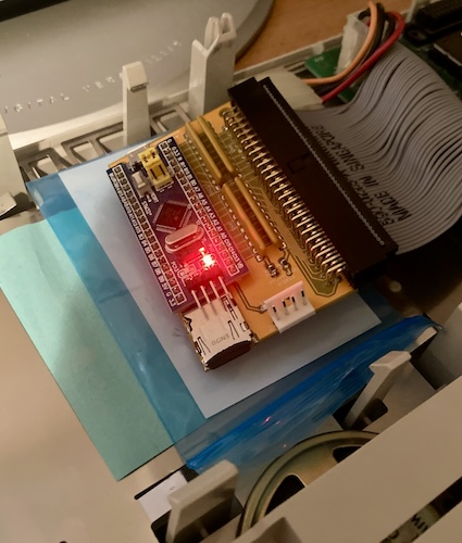 The ArdSCSIno's Blue Pill is lighting up and blinking when connected to the bus of the Bad ADB Mac LC.