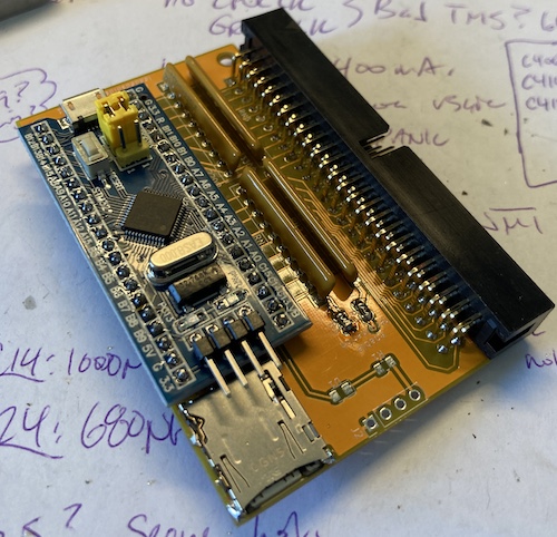 An assembled v0.1 board, minus the debug LED and power header.