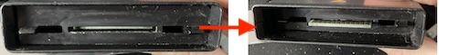 The cartridge slot cover retracts to expose an edge connector.