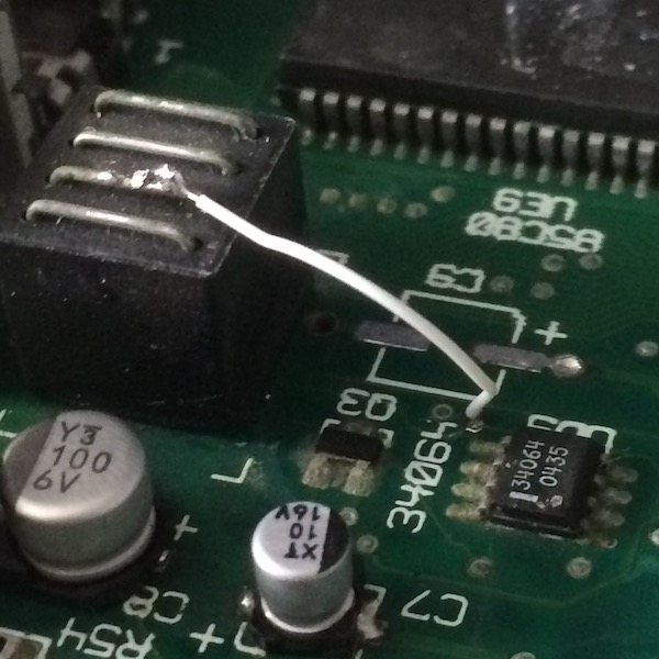 An ugly solder joint from the top of the ADB choke to the via that eventually goes to pin 20