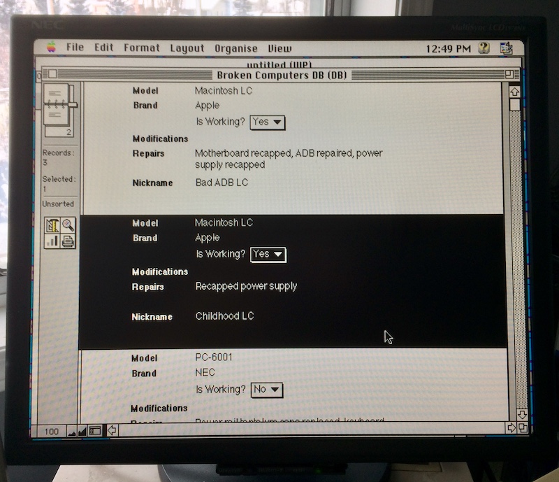 The ClarisWorks database viewer is open. It shows the list of repairs I have done to the bad ADB Mac LC.