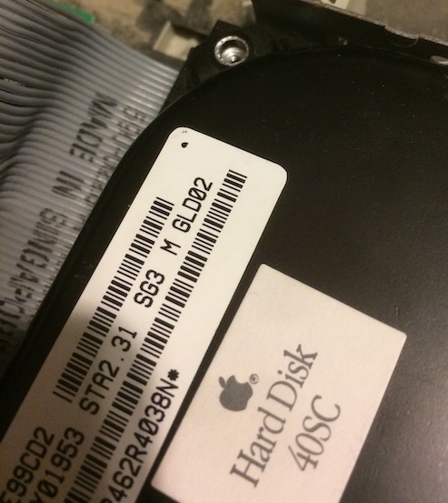 The Conner hard drive is missing its screws