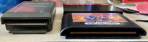 The cartridge size comparison, from the bottom. The BBC cartridge is nearly twice the thickness of the Genesis one.