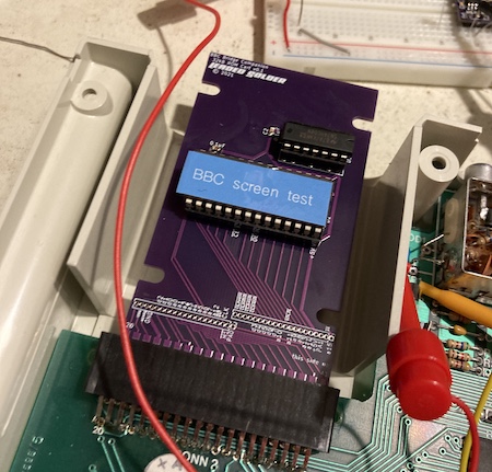 The purple PCB that I designed, showing a label marked "BBC Screen Test" on it.