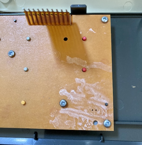Some white residue on the backside of the "controls" panel.