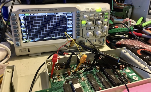 The Rigol DS1202Z-E scope hooked up to the BBC's guts. You can also see a growing junkyard of multiple in-progress projects behind the scope. Priorities.