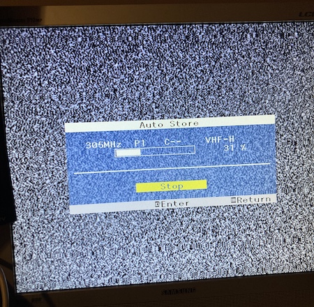 The Samsung 910MP is scanning for channels. It is at 305MHz and reports itself to be about 31% through the UK VHF spectrum.