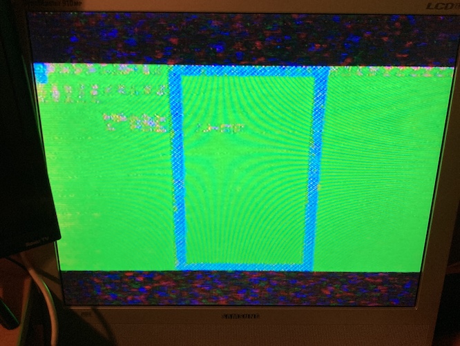 The second BBCBC is now running my game. You can see a blurry rectangular playfield in the middle of all the blurry green.