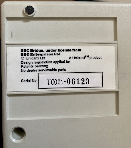 The serial number on the bottom of the machine is UC001-06123. It says "No dealer serviceable parts."