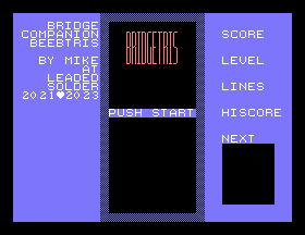 An early title screen. It says BRIDGETRIS and then PUSH START. The background colour has changed from the previous screenshots, as I figured out it looked way better on crappy TVs from the Soggy-1000 RAM tester