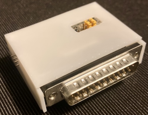 A white box with a DB25 poking out of it is what a BlueSCSI external looks like.