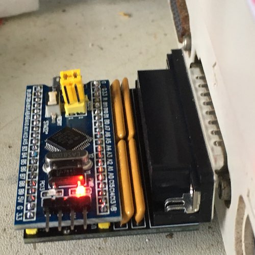 The external BlueSCSI, freshly assembled, connected to the back of the Magic Smoke SE.