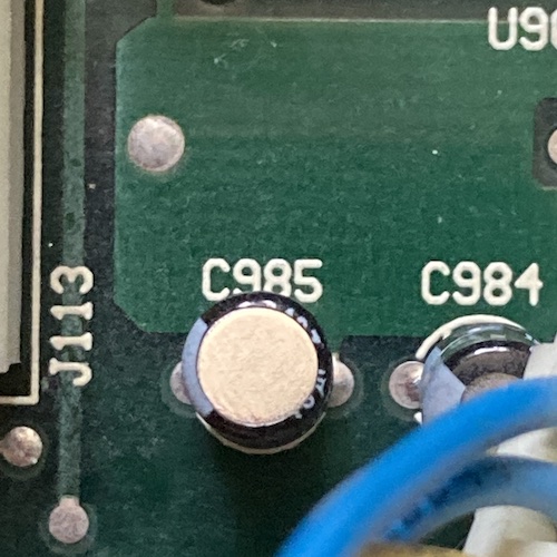 The C985 cap has almost no heat shrink around the top.