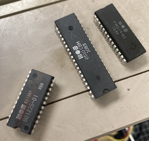 The 901225-01 ROM, with a red line through the middle of it, the 6510 CPU, and the 905114-01 PLA, all dead.