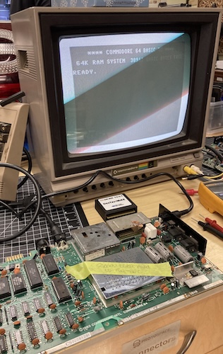 The screen says: Commodore 64 64K RAM system 38911 bytes free. Ready!
