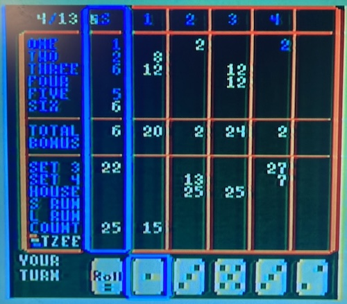 Fujitzee is running. I have a handful of dice at the bottom of the screen, along with an option to "roll." Each column shows an individual player's scoring at the game.