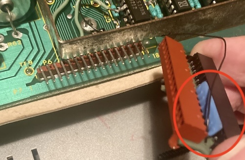 A blue resistor network on this little bodge board is circled.