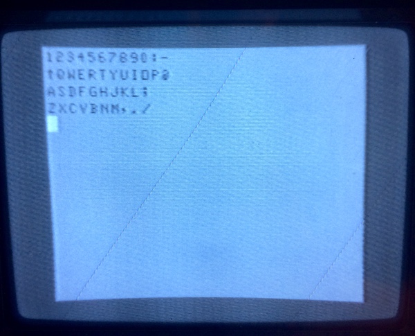 A screenshot of the TV showing the CoCo. All the keys are working except for left shift and space.