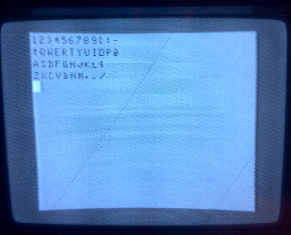 A screenshot of the TV showing the CoCo. All the keys are working except for left shift and space.