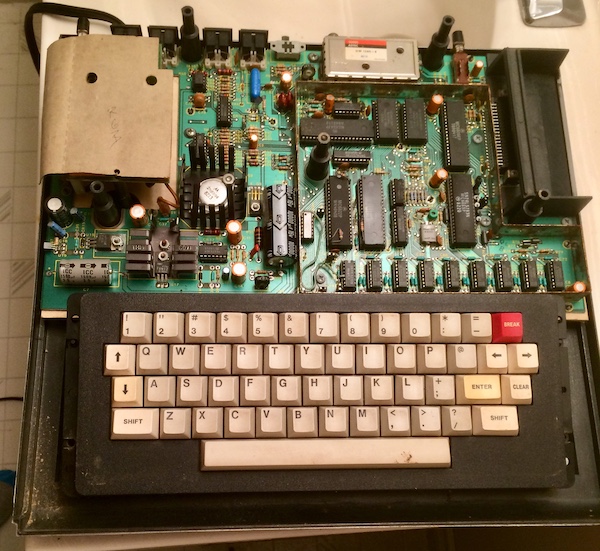 CoCo case removed, showing the motherboard and keyboard