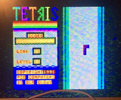 The opening screen of the "Tetris" game loaded from FujiNet on my CoCo. My score is zero, my lines are zero, and I am just happy to be this far.