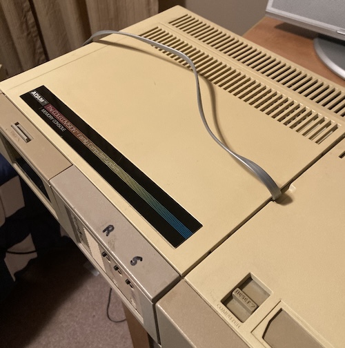 The top is popped on the ADAM Memory Console.