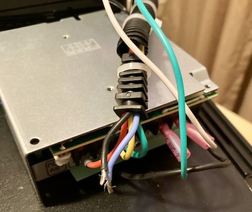 Two ferrules have failed, leaving some bare wires hanging out of the ADAM-side connectors.