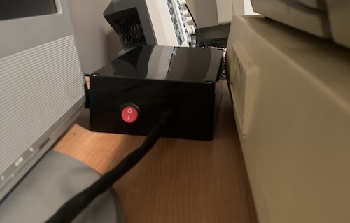The power supply box is tucked in away behind the ADAM, with plenty of room for cables.