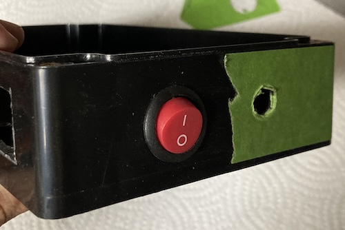 The power switch is now installed. It looks somewhat less crooked than this in real life.