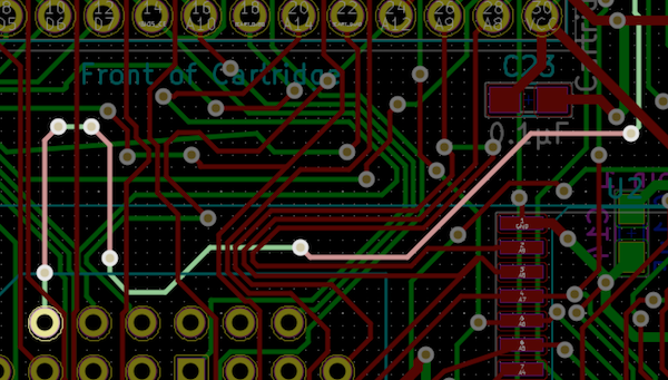 A highlighted trace running to the CPU clock pin of the Z80. It passes through six vias and crosses under the cartridge data bus