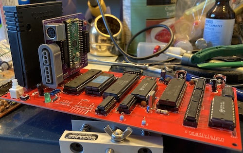 The controller board is assembled and inserted into the Creativision.