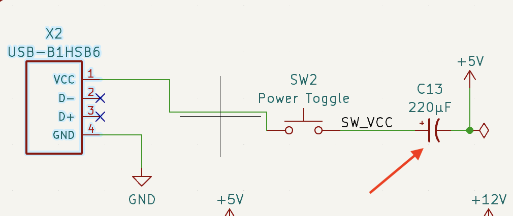 There is a 220µF series capacitor blocking the output through the power switch.