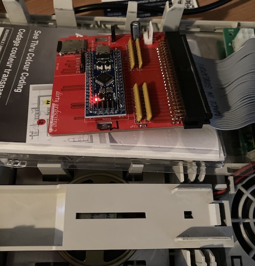 The ArdSCSIno is jammed into the Bad ADB Mac LC's hard drive bay.