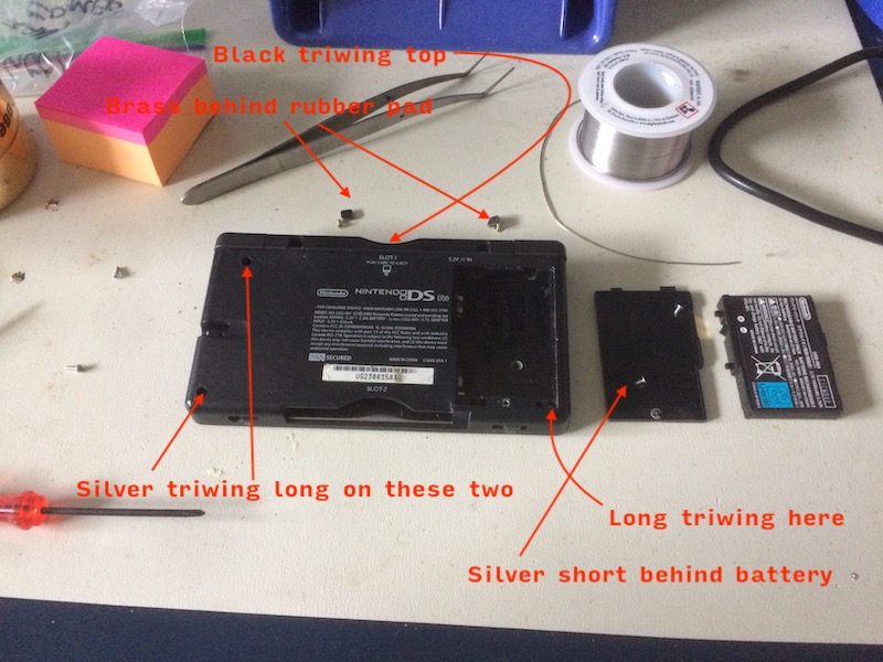 The backside of the DS Lite, showing the primary screws that need removal