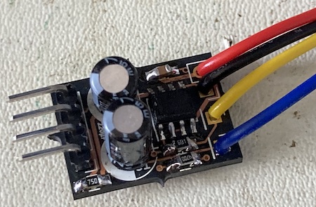 The 90-degree male pin header that will accept the DuPont connector from the TRRS jack. The wires going to the motherboard are soldered in.