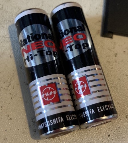 The batteries, lying on my filthy ESD mat. They are marked as National NEO Hi-Tops.