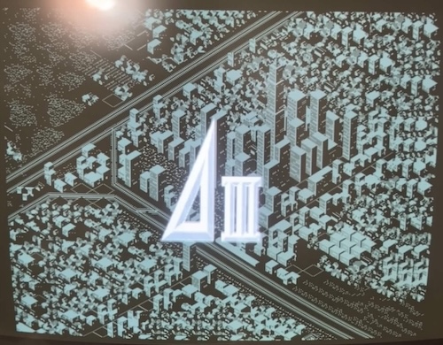 The title screen to A-Train III displayed on my MultiSync 3D. A bustling metropolis is in the background.